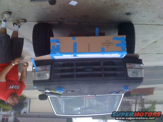 1992 Ford Bronco grille with a cardboard template taped to it