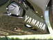2008 Yamaha R1 - A close-up view of the side fairing on a Yamaha motorcycle, showing branding and engine details.