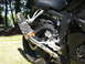 2008 Yamaha R1 - Motorcycle's rear wheel and exhaust system shown in detail outdoors.