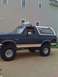1992 Ford Bronco - This lifted 1992 Ford Bronco features off-road tires and auxiliary lights mounted on the roof rack.