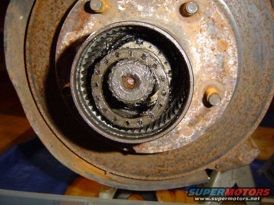 dsc05187.jpg Axle nut washer coming out. Using a very small screw driver and some patience.