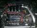 1995 Ford Probe - Engine bay with V6 DOHC 24 valve engine and turbocharger modifications visible.