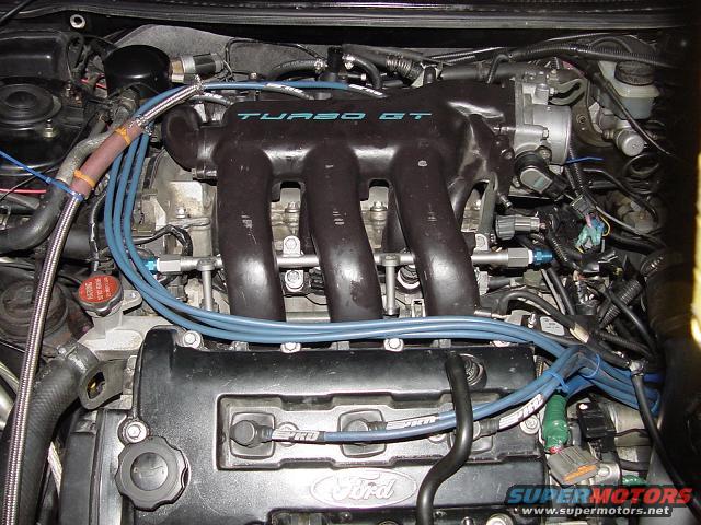 Engine bay with Turbo GT intake manifold and Ford valve cover