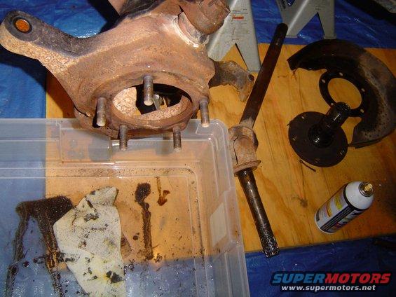 After soaking the spindle in PB blaster for 2 days it was ready to come off. Still took some finagling but it did come off! Then, dust shield, caliper bracket, axle. Now all thats left is the Knuckle but it will wait until the pumpkin gets a rebuild.