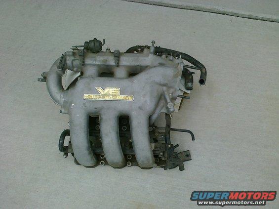 V6 24-valve intake manifold with hoses and sensors attached
