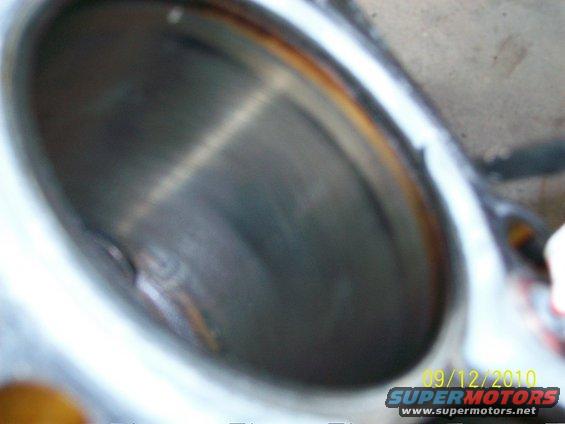 Close-up of an engine cylinder bore with some rust discoloration