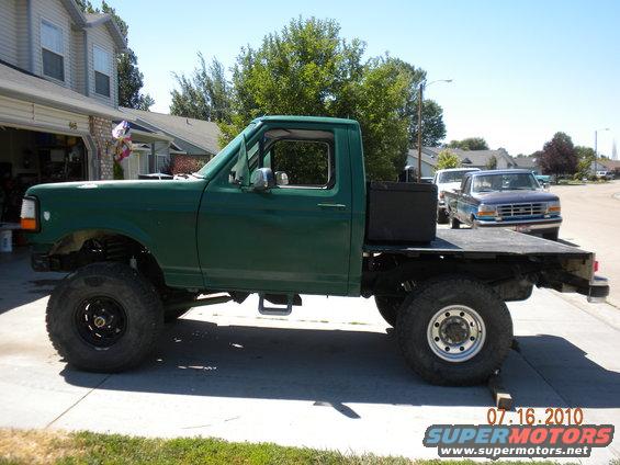 007.jpg now green with cheap wood flat bed to make street legal 
