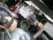 1969 Ford Mustang - Close-up view of an engine block, showing the water pump and spark plug wires.