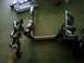 1995 Ford Bronco - Exhaust headers and pipes are shown on a floor, possibly for a vehicle.