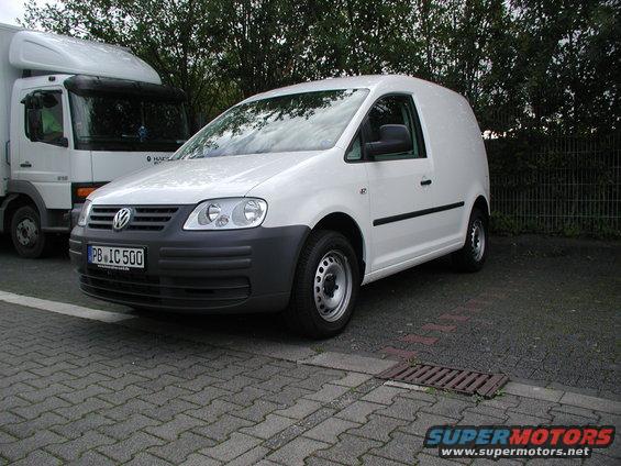 White panel van with a Volkswagen logo on the grille and license plate PB IC 500
