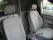 2009 Holden Commodore - Interior view of a van's front seats and cargo area, with another vehicle visible through the window.