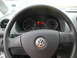 2009 Holden Commodore - Interior view of a Volkswagen with a close-up of the steering wheel and dashboard instruments, including the odometer reading 356.