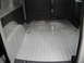 2009 Holden Commodore - The cargo area of a van is shown, with a white ribbed floor and grey side panels.