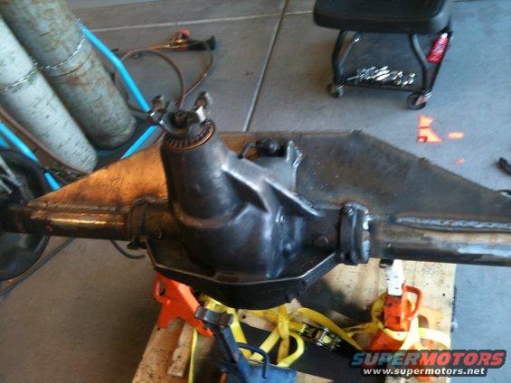 Rear axle assembly on orange jack stands