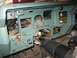 1981 Ford Bronco - Interior view of a vehicle's dashboard with wiring exposed during a repair or modification.