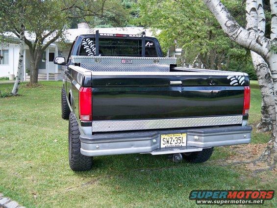 1995 Ford F-150 pickup truck rear view with toolbox and rack