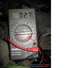 1986 Ford Ranger - A digital multimeter is used to measure current in a vehicle's engine bay.