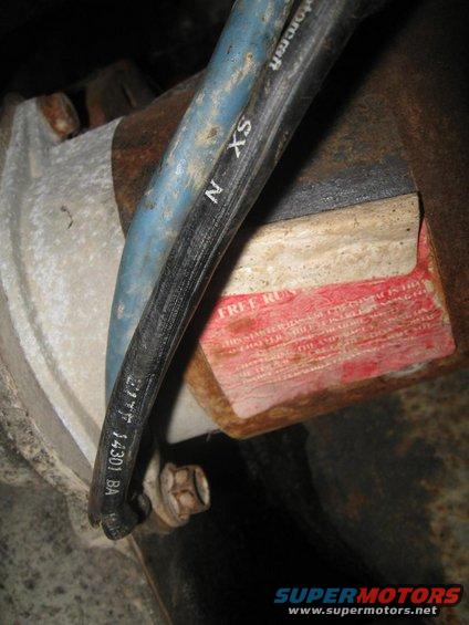 Close-up of a Motorcraft part with a red label and part number 2177F 14301 BA