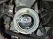 1995 Ford Mustang - Close-up view of an engine's distributor cap and rotor assembly.