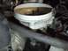 1995 Ford Mustang - Engine distributor cap detail, part of a larger automotive system.
