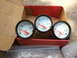 2003 Acura TL - A set of three automotive gauges, including water temp, transmission temp, and oil pressure, are displayed in a box.