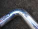 2003 Acura TL - A chrome intake pipe with an AEM logo is shown, indicating it is a performance part.
