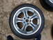 2003 Acura TL - Aftermarket alloy wheel and tire assembly shown on a concrete surface.