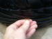 2003 Acura TL - Checking tire tread depth with a coin.