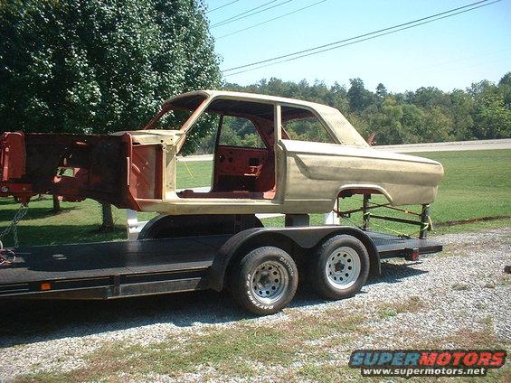Bringing her home from the body shop. All body work done & put in primer. I'm going to cut off the front end garbage & weld in a new Martz front snout with coil-overs & rack & pinion. Will fit up the engine & drivetrain & then take it back to Danny to get painted.