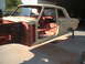 1964 Ford Fairlane - The body shell of a 1964 Ford Fairlane is shown in primer, ready for restoration.
