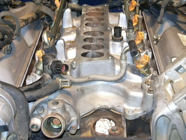 dscn0349.jpg If you look close you can see that I put the thermostat in backwards.  This really caused me grief.  The truck overheated and I thought I would have to tear it all down again!