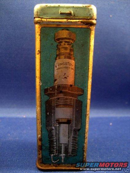 Tin box with a diagram of a cutaway spark plug labeled TUNGSTEN