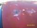 2002 Ford Crown Victoria - Hood of a car with visible primer and rust damage, dated 09/20/2010.