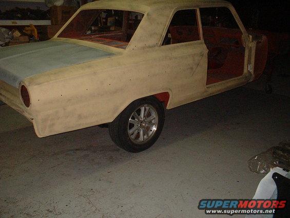 dscf0058.jpg Threw on a couple of 17&quot; Mustang tires/wheels so I could roll it around. Installed the rear end housing & axles/brakes so I could get some of the parts out of the shop & on the cars they belong. Got to get some room in there !!!!!!