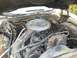1978 Ford Ranchero - The engine bay of a 1978 Ford Ranchero shows its V8 engine and associated components.