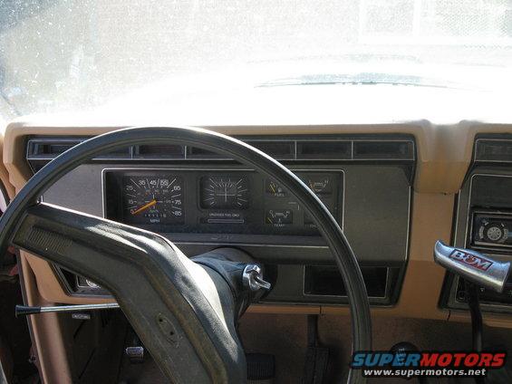1981 Ford Bronco interior dashboard with speedometer and fuel gauge