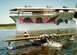 1997 Ford Deluxe - Model seaplane floats on water with a large ship in the background. 'Best In Show' text is visible.