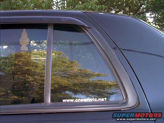 custom made www.crownvic.net decal.  Closeup of window molding black.out.