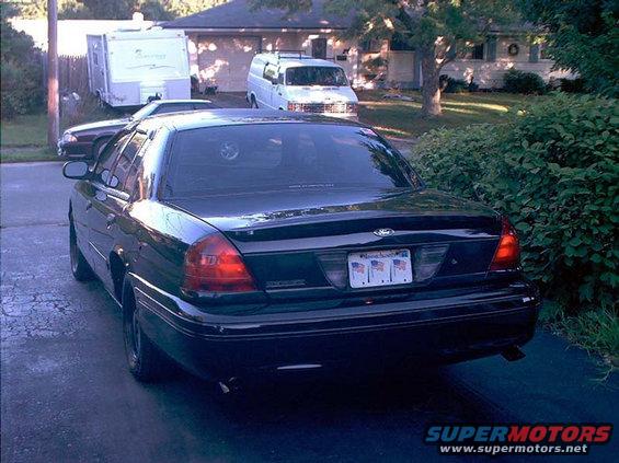 Marauder rear decklid spoiler, custom made chrome tips, rear LED lights.