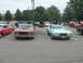 1972 Ford Ranchero - A light green 1972 Ford Ranchero is parked in a lot, facing forward, with another car to its left.