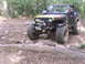 1996 Ford Bronco - This modified Jeep Wrangler navigates a challenging rocky trail, its off-road capabilities.