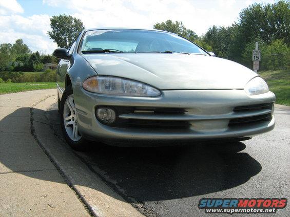 Silver Dodge Intrepid parked on a curb, front quarter view