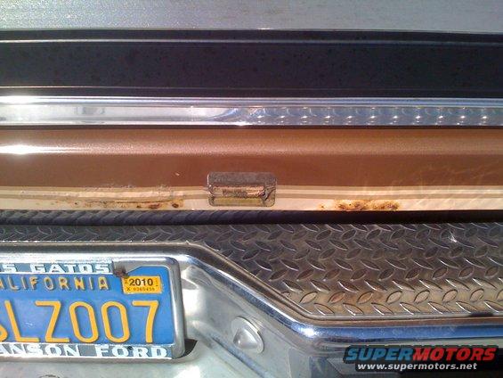 1986 Ford Bronco rear bumper with California license plate SLZ007 and SuperMotors.net logo