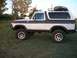 1978 Ford Bronco - This lifted 1978 Ford Bronco is equipped with a roof rack and cargo carrier, ready for adventure.