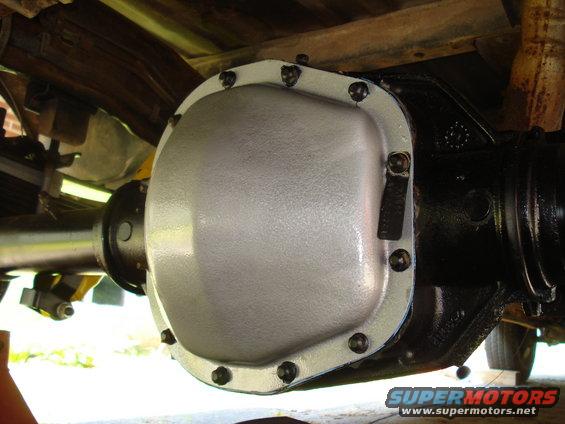 Rear differential cover with bolts and driveshaft connection