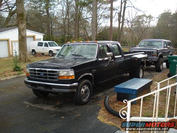 Black 1994 Ford F-350 pickup truck, 3q-front view