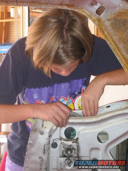 100_0095.jpg removing qtr window