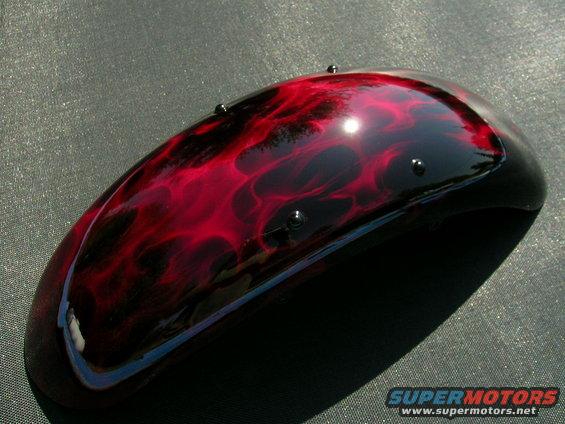 motorcycle fender with red and black flame paint job