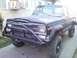 1980 Jeep Cherokee - This 1980 Jeep Cherokee features a heavy-duty custom front bumper and off-road tires.