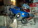 2008 Ford F-250 - RC truck resembling a 2008 Ford F-250 is positioned on a pile of concrete debris.